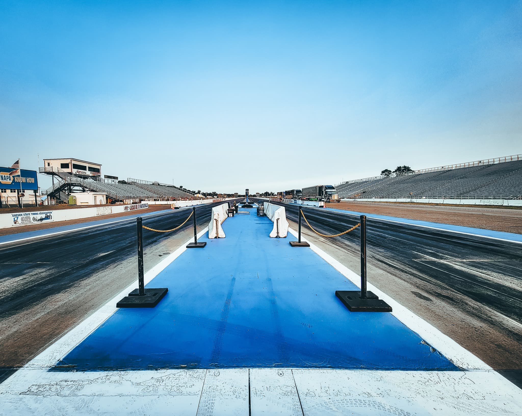 Empty quarter-mile drag strip and grandstands at Brainerd International Raceway in Minnesota before a race