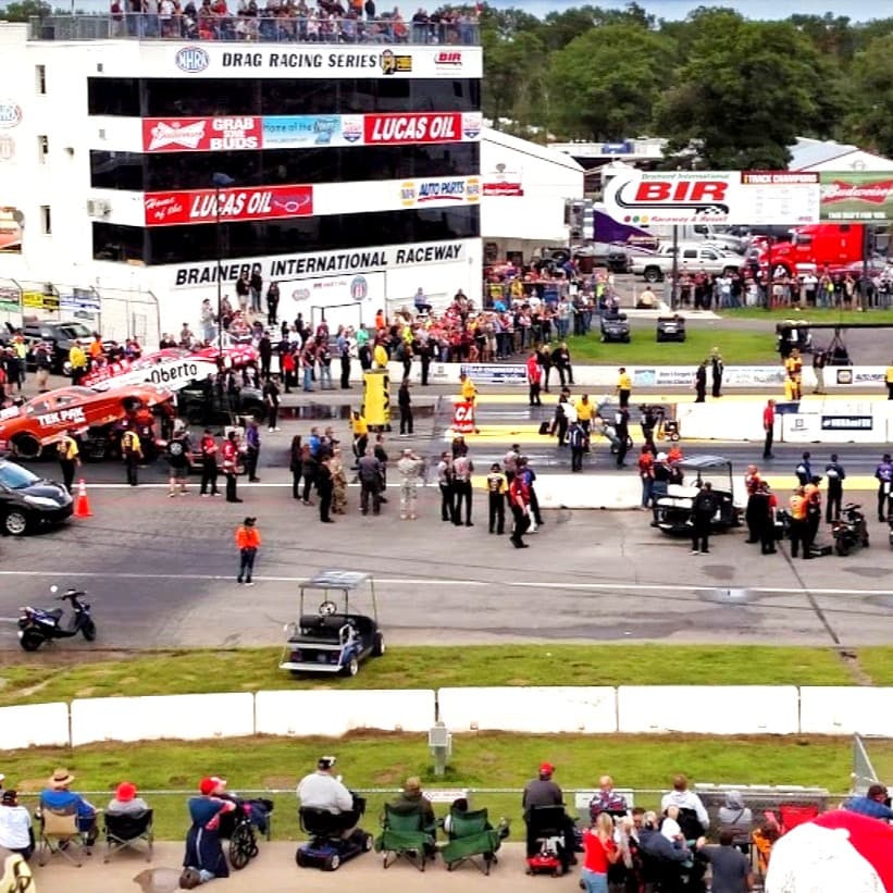 NHRA funny car staging at the starting line beneath the Brainerd International Raceway tower, Minnesota