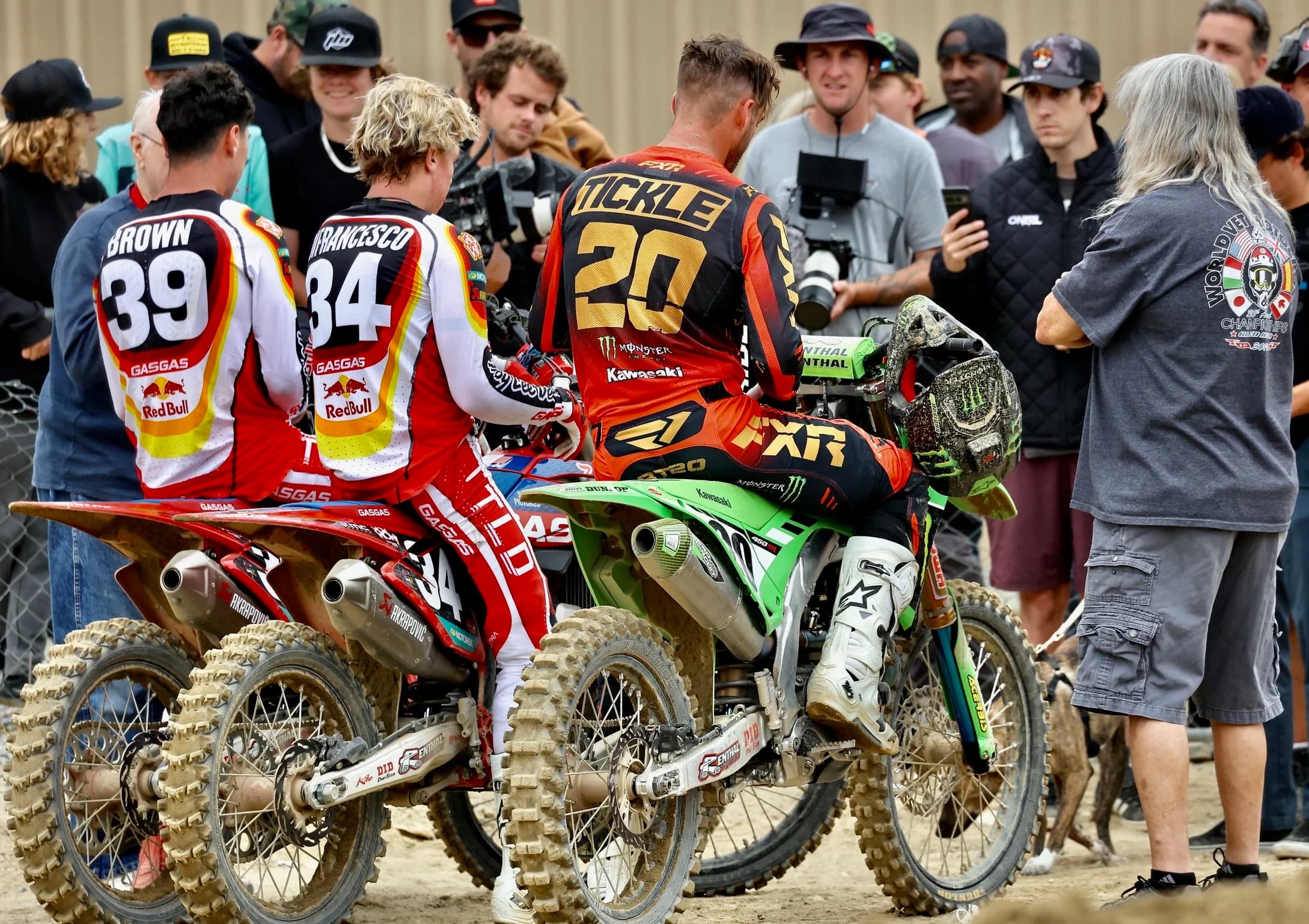 Pro motocross riders including Brown, Francesco, and Tickle with GasGas and Kawasaki bikes in the Glen Helen Raceway paddock